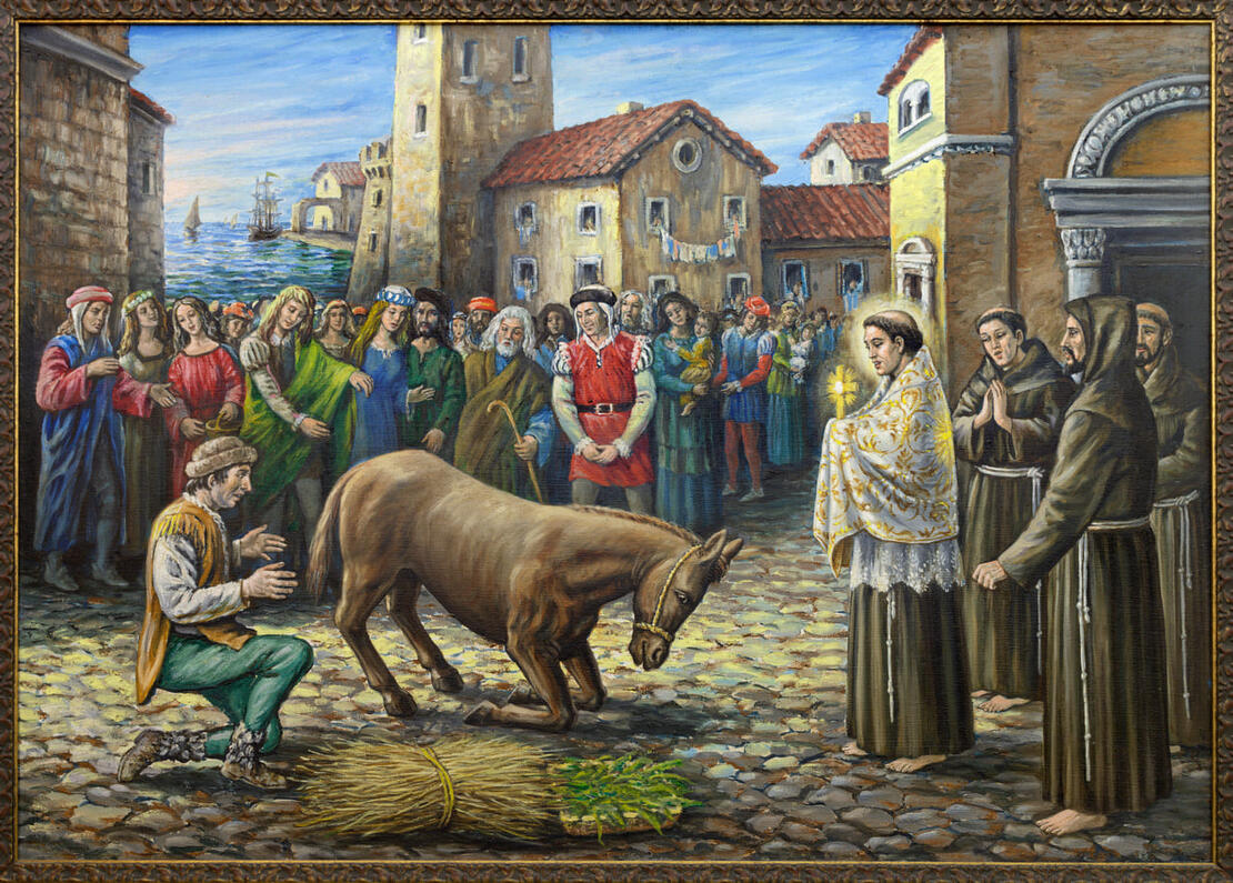 Pintura religiosa que representa el milagro de San Antonio Abad con un burro arrodillado ante el santo mientras una multitud 